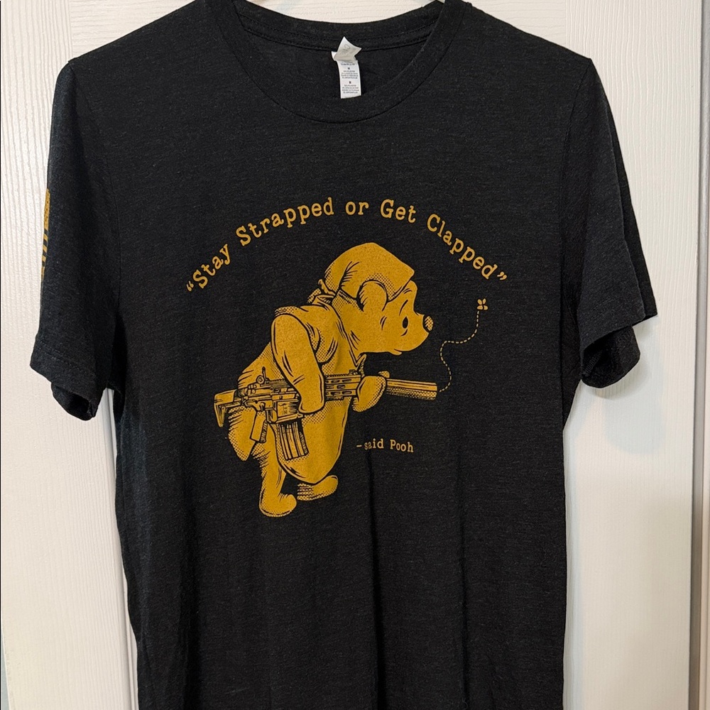 NineLine Apparel Stay Strapped Graphic Tee in Black and Gold